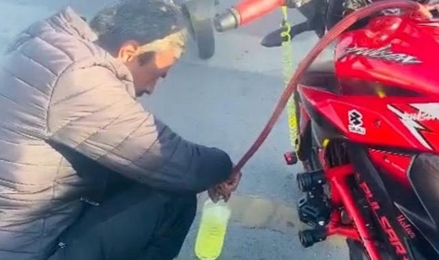 "Motosikletim bozuldu" bahanesiyle benzin topladı